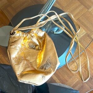 Gold pouch bag